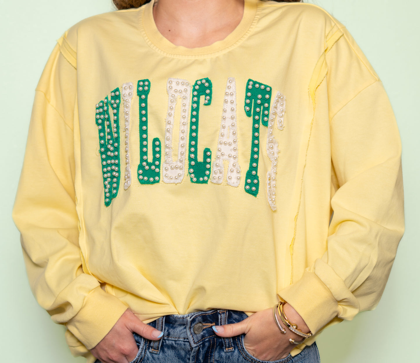 Wildcats | Women's Distressed Embroidery Pullover (Butter Yellow)