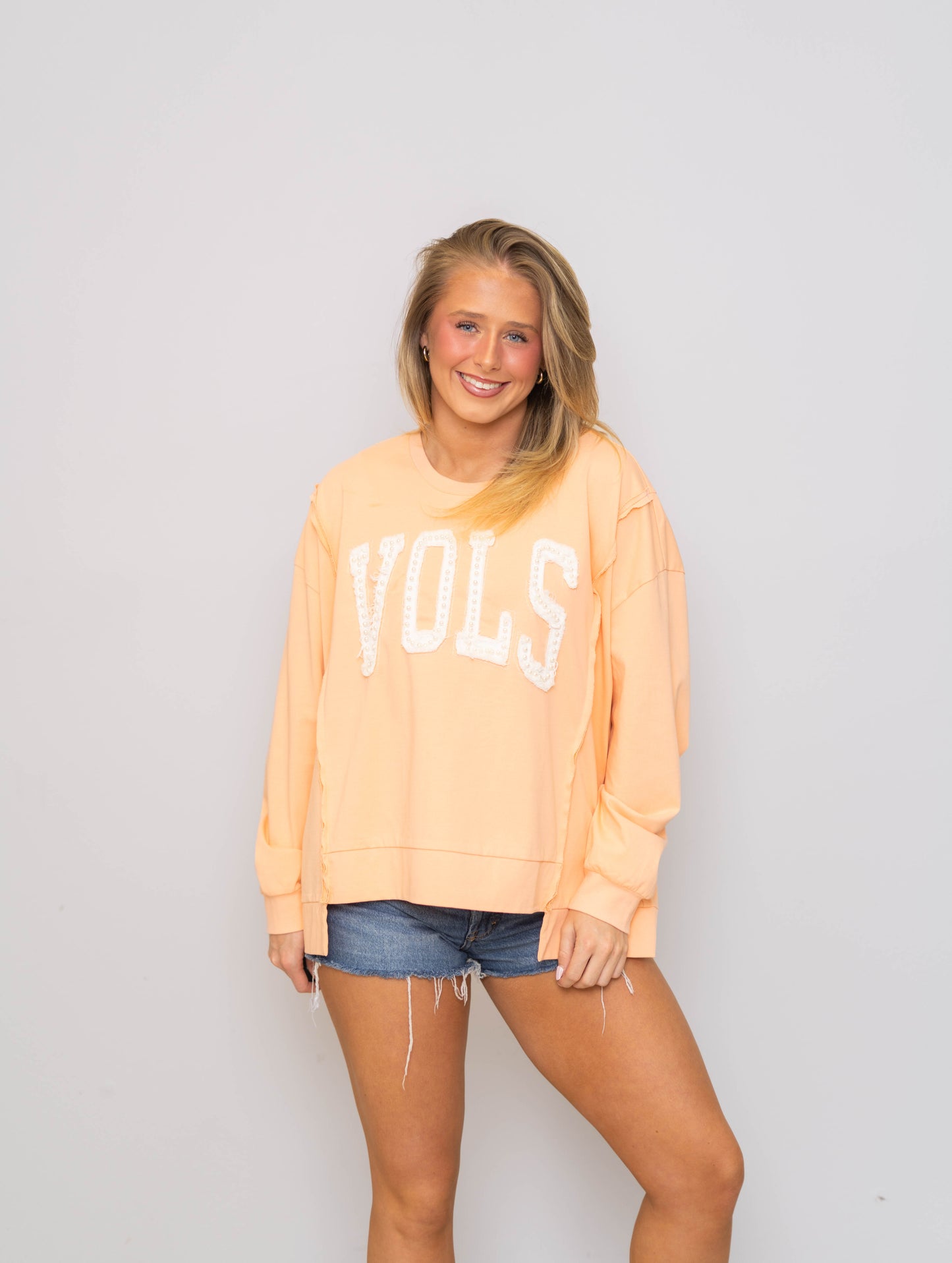 Tennessee Vols (LICENSED) | Women's Distressed Embroidery + Pearl Pullover (Light Orange)